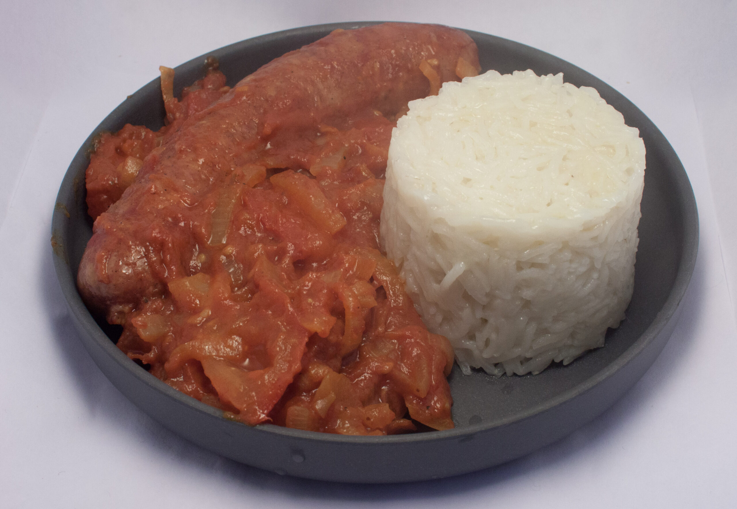 Cari de saucisses avec sauce rougail tomate